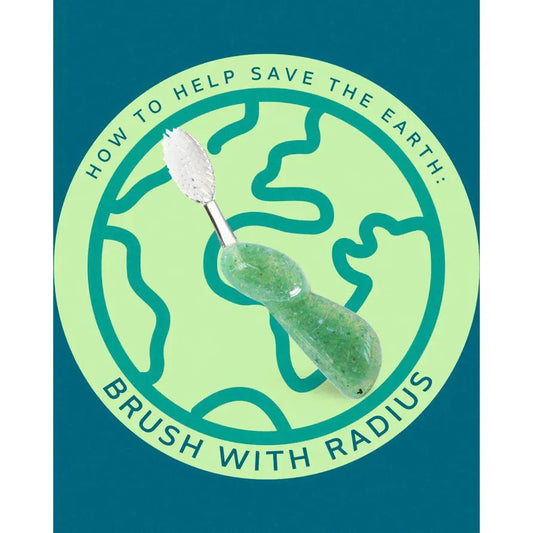 Green replaceable soft-head toothbrush with white bristles, angled head