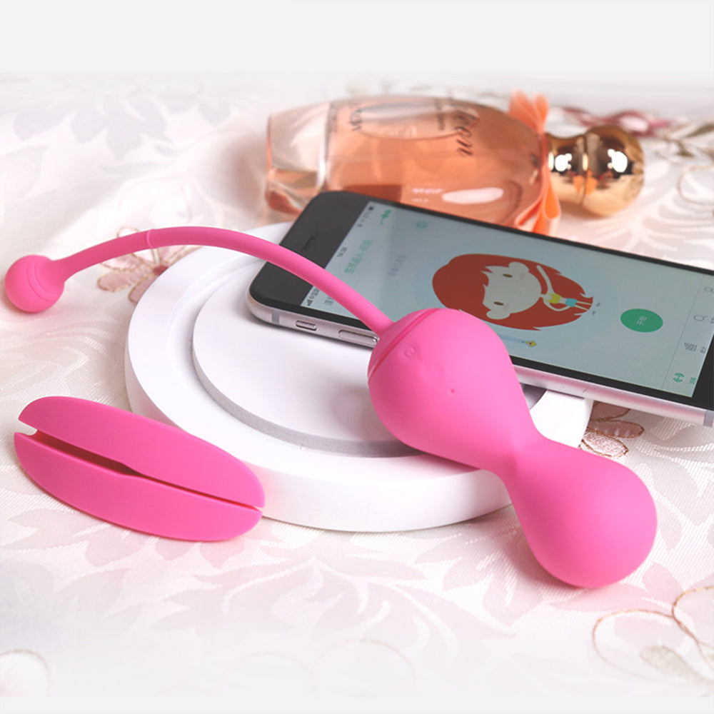 Pink pelvic floor exercise device with two curved silicone probes
