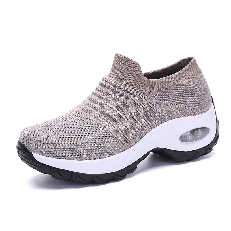 Beige knit slip-on sneakers with white sole and air-cushioned heel