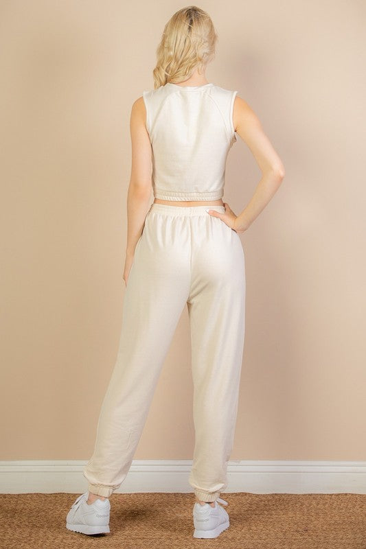 Cream sleeveless tank top and joggers set, elastic waist, back view