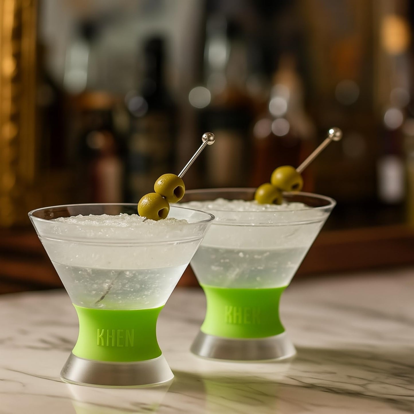 Set of 2 martini glasses with lime frosted bases and ice-filled clear cups