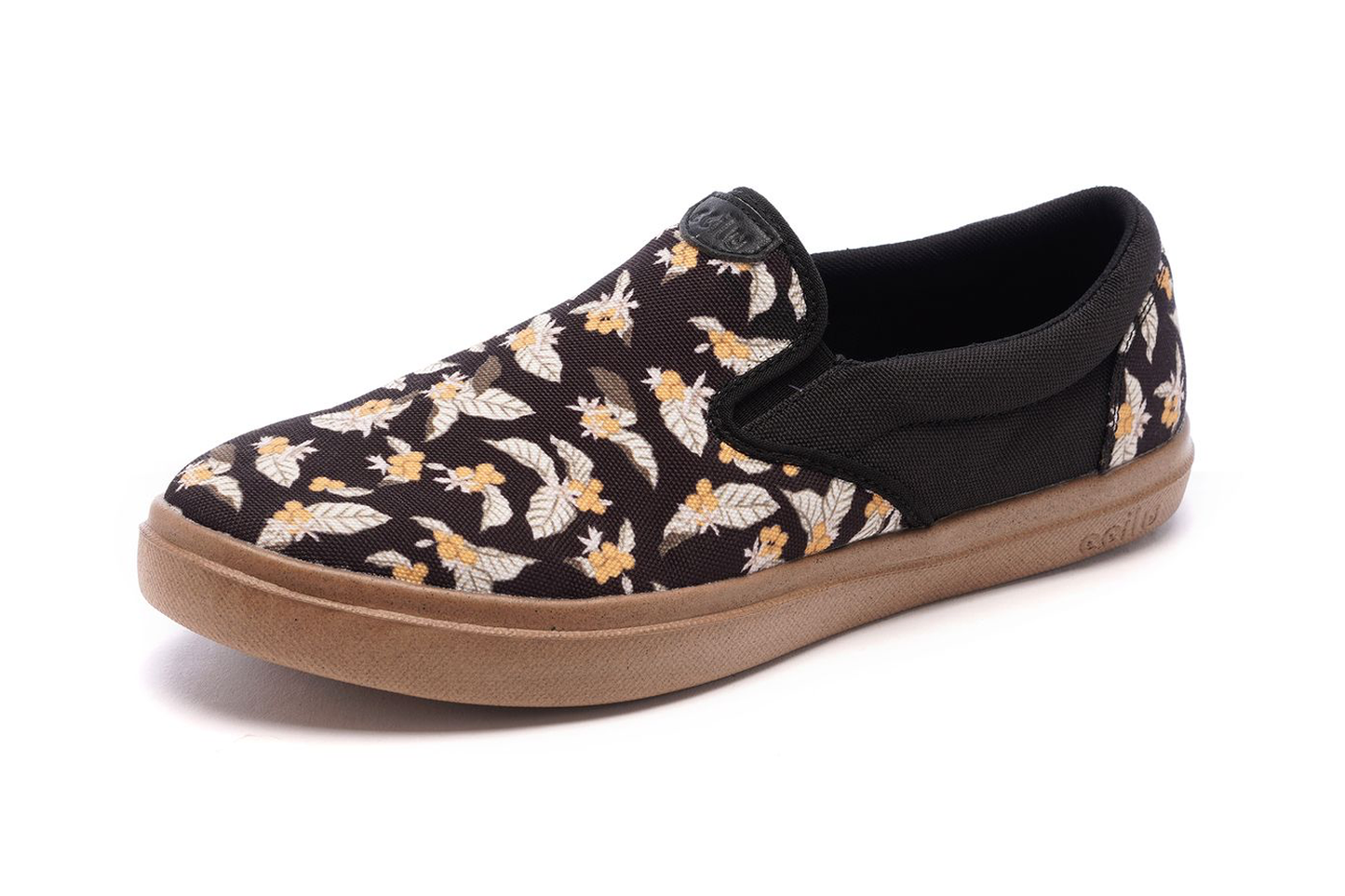 Men's slip-on sneakers with black floral print upper and tan low-profile sole