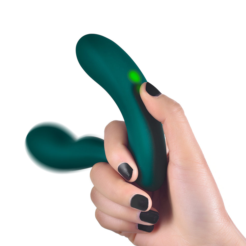 Teal silicone prostate massager with small glowing control light on the handle.