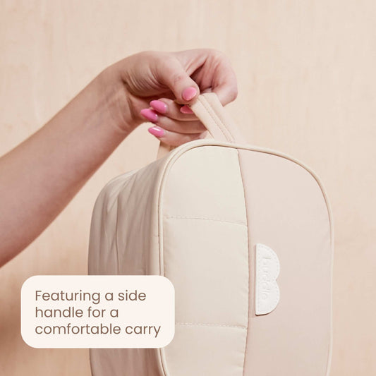 Light beige bum bag with side handle and embossed logo tab