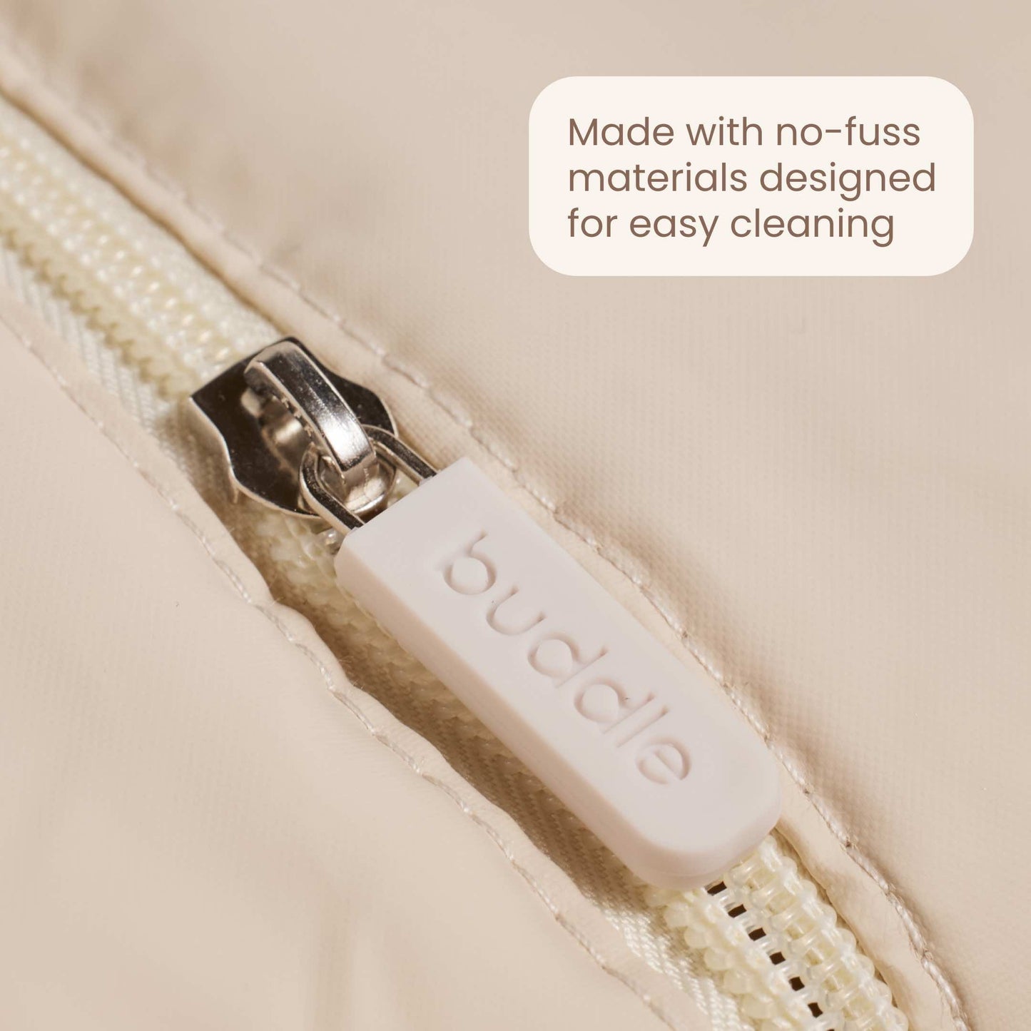 Light beige bum bag zipper with branded white pull tab