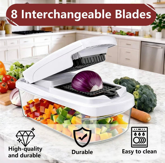 White multi-blade vegetable chopper set on countertop with black slicing grid plate