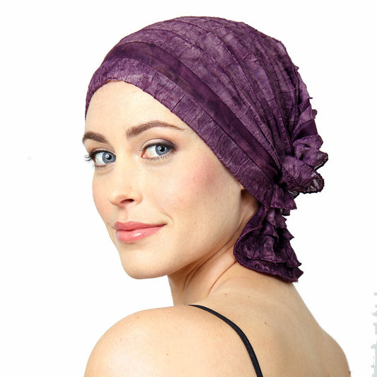 Purple chemo beanie cap with ruched stripes and side bow
