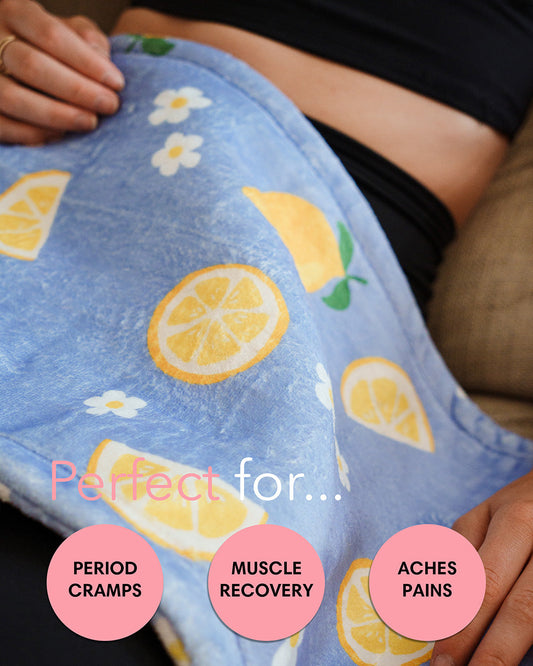 Blue lemon and flower plush heating pad wrap, close-up view