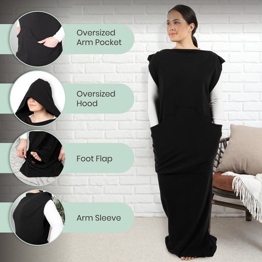 Black wearable hoodie-blanket with oversized hood, arm sleeves, and front pocket