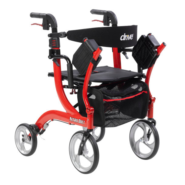Front-left view of red and black transport chair with padded seat, armrests, and casters