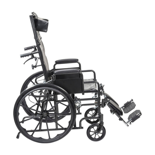 Side view full-reclining wheelchair with desk arms, padded black seat, footrests