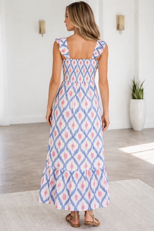 Sky blue ikat-pattern midi dress, back view with ruffle sleeves