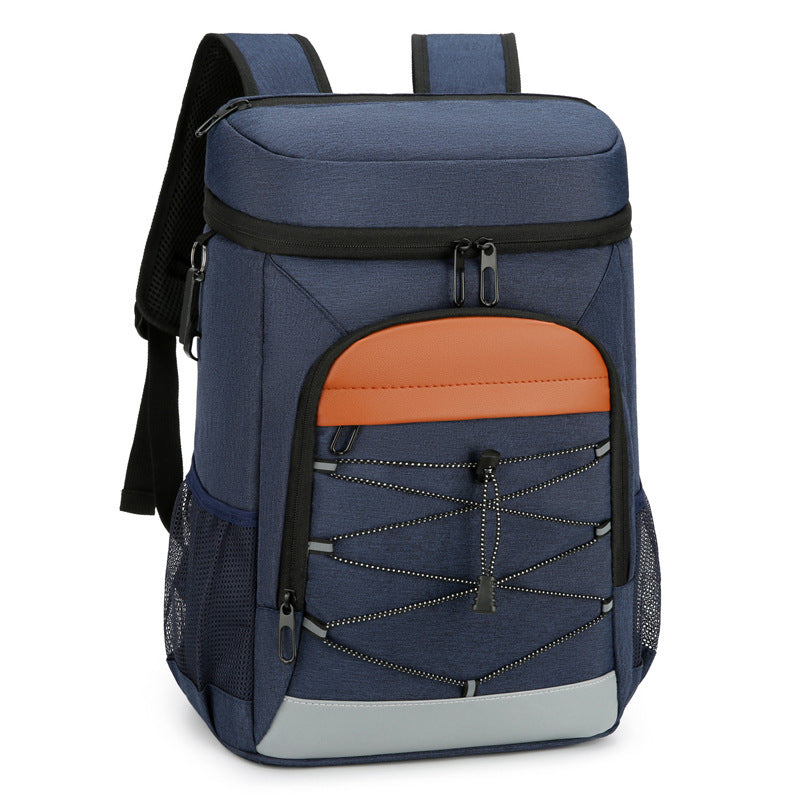 Navy insulated backpack with orange front panel, zippered top closure, and mesh side pocket