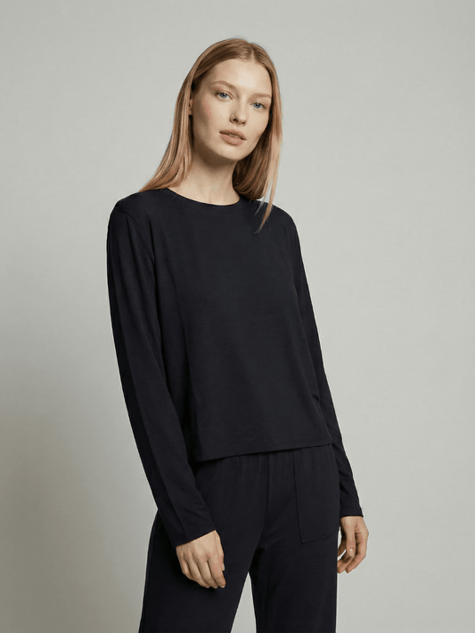 Black long-sleeve pajama top with crew neck and relaxed sleeves