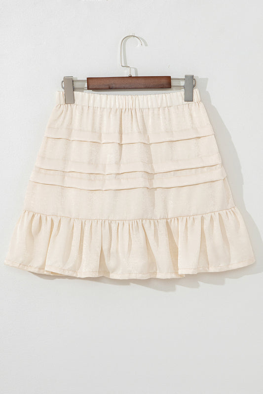 Beige tiered mini skirt with elastic waist and wide layered ruffles