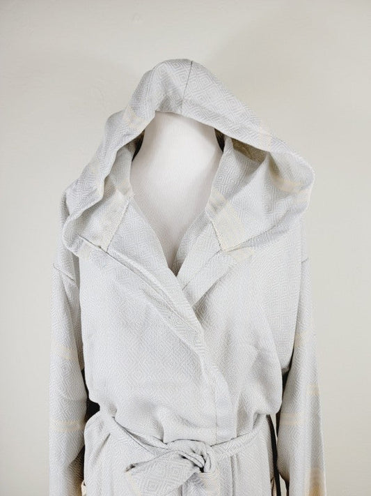 Off-white hooded robe with open collar and tie belt, patch pockets