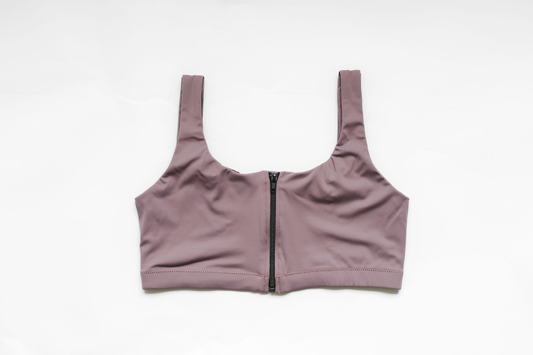 Mauve purple post-surgical bra, flat front view, center zipper seam, wide elastic straps