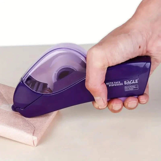 Hand holding a purple tape dispenser with a white background