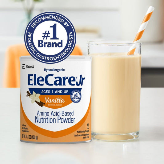 EleCare Jr vanilla amino acid-based nutrition powder can with prepared drink in glass
