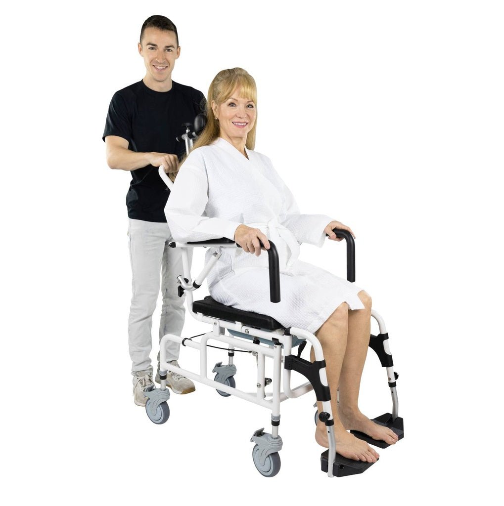 Rolling shower commode chair with armrests and black foot supports, reclined seating