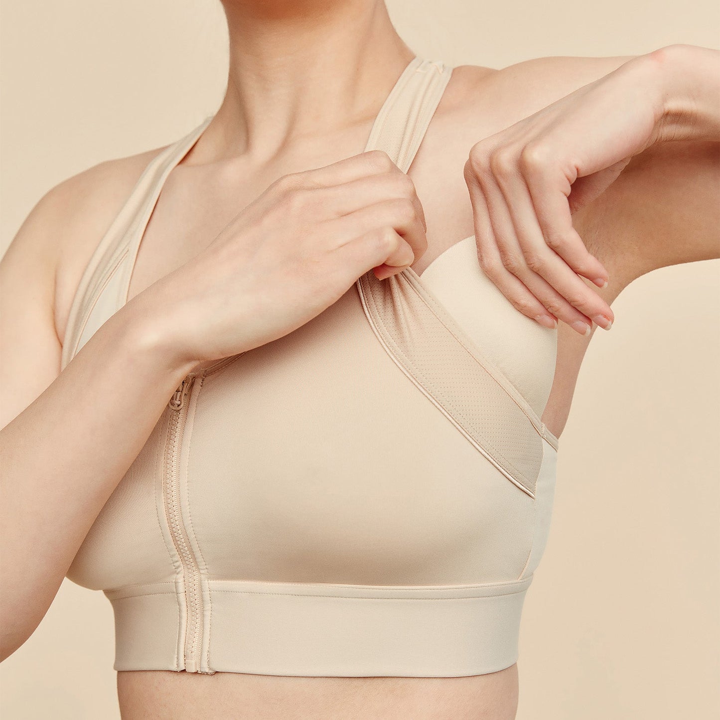 Buff sports bra side view with front zipper placket and supportive wide band