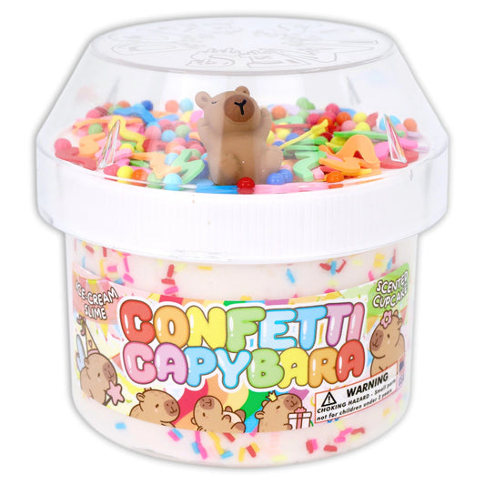 White slime tub with brown capybara figure, lid on, and colorful confetti inside