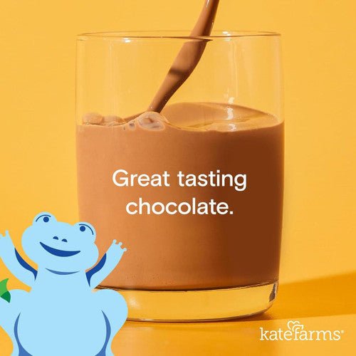 Chocolate formula shake in a glass with straw, Kate Farms Pediatric Standard