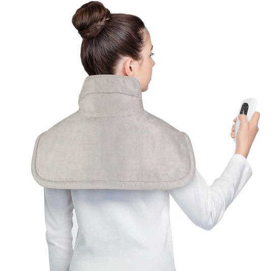 Neck and shoulder heating pad, plush gray cover, worn over shoulders with controller in hand