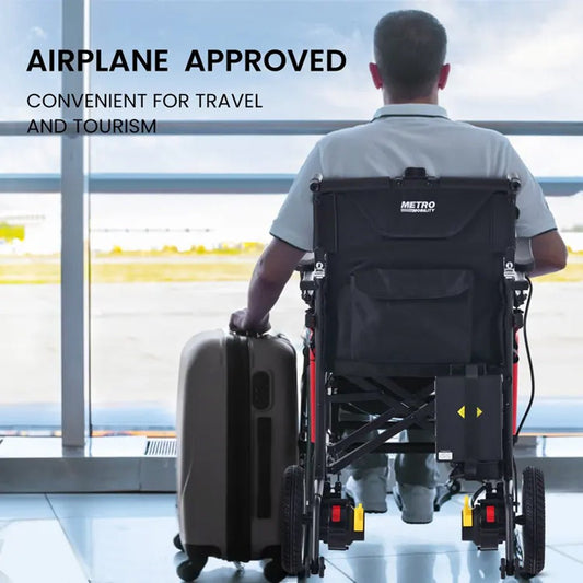 Power wheelchair with black seat back, rear transport bag, and folding support frame