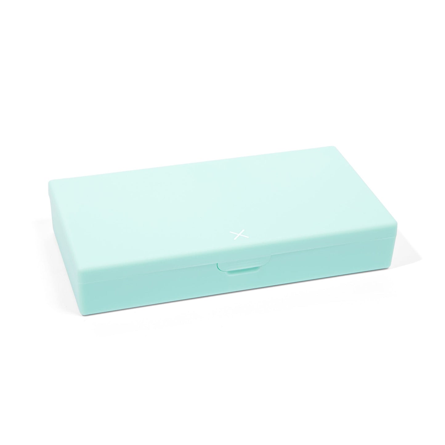 Mint pill organizer case, closed with centered handle and X logo