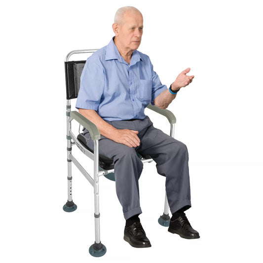 Shower commode chair with arms, black backrest and cushioned seat; seated user posture