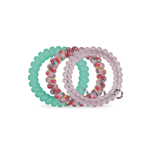 Set of mint and clear spiral hair ties with pink patterned bands