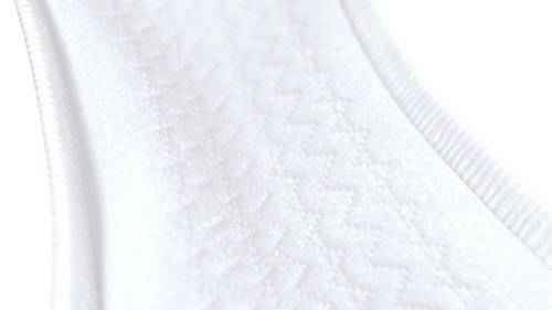 White heavy-absorbency pad with textured fabric surface