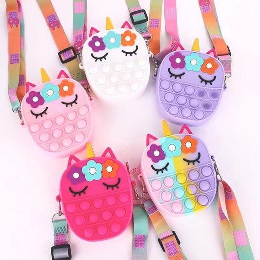 Assorted unicorn fidget pop crossbody bags, cute face and rainbow webbing straps