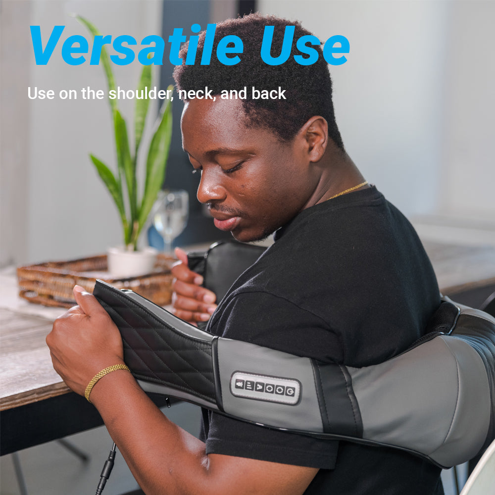 Heated shiatsu neck and back massager worn on shoulders with strap