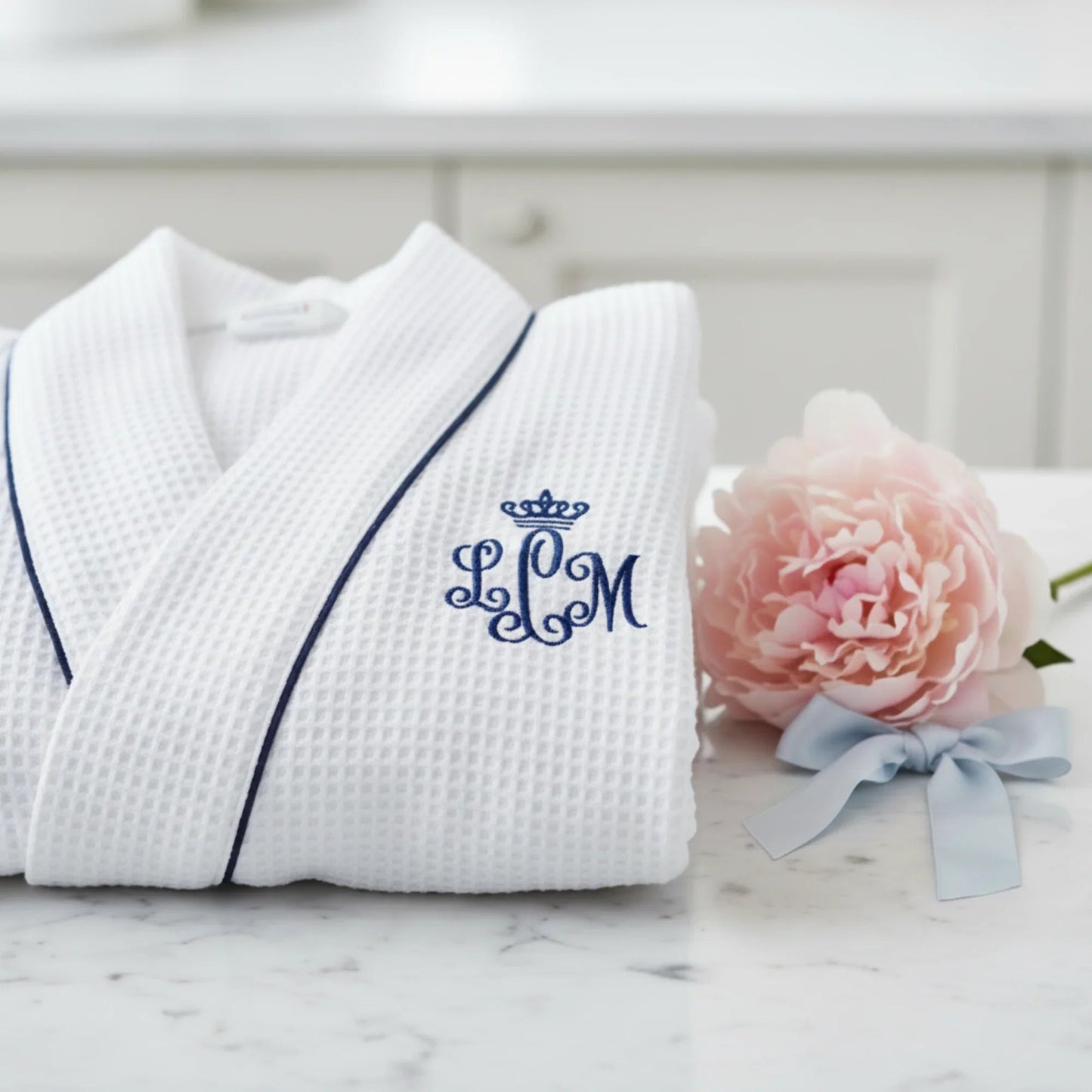 Women’s knee-length waffle robe, white with dark piping and embroidered monogram