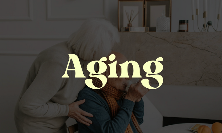 Word Aging on top of a photo of an eldery couple