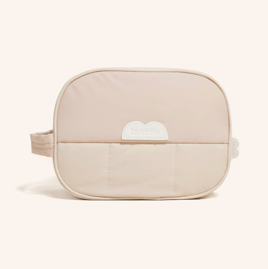 Beige toilet supply bag on cream background