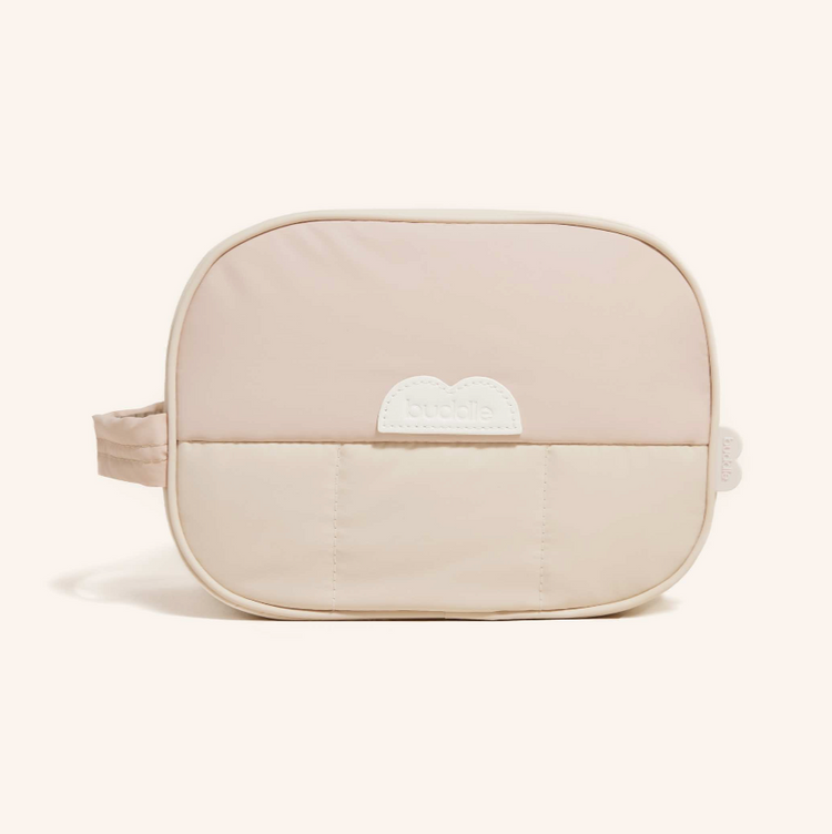 Beige toilet supply bag on cream background