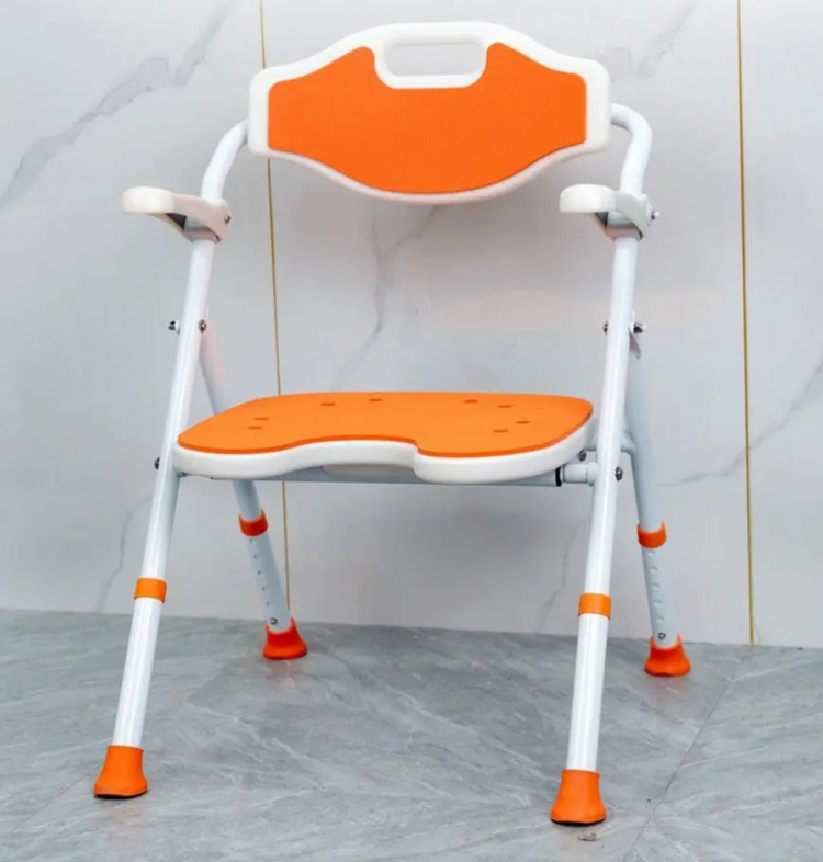 Orange shower chair in grey shower