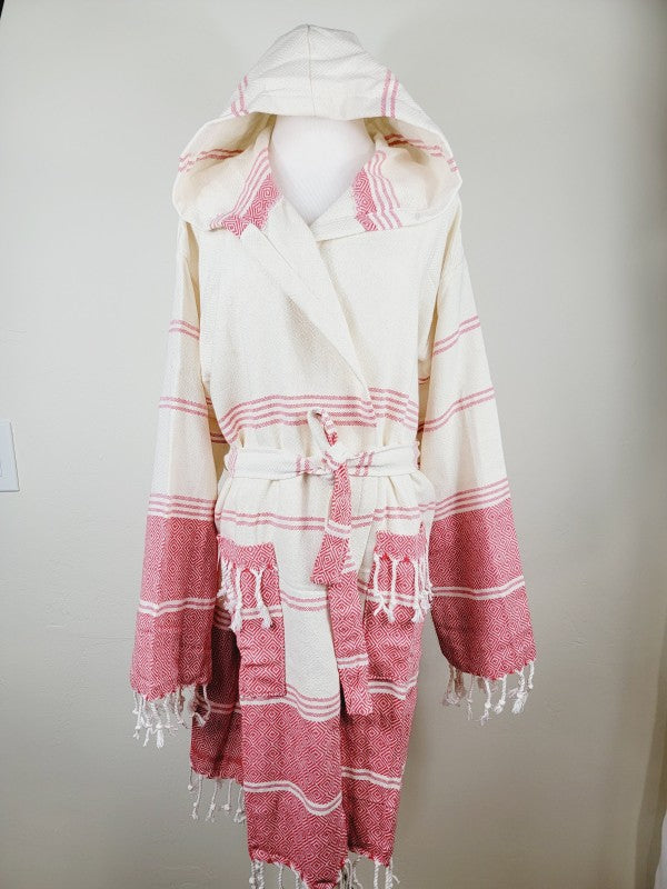 Unisex hooded bathrobe front view: cream with pink stripe and geometric print, tassel trims, belt.