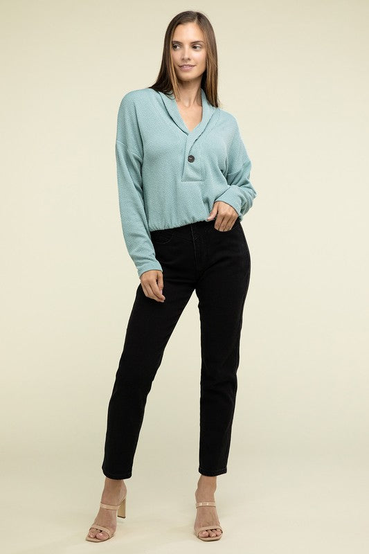 Teal textured pullover top with collared V-neck, two buttons, and chest pocket
