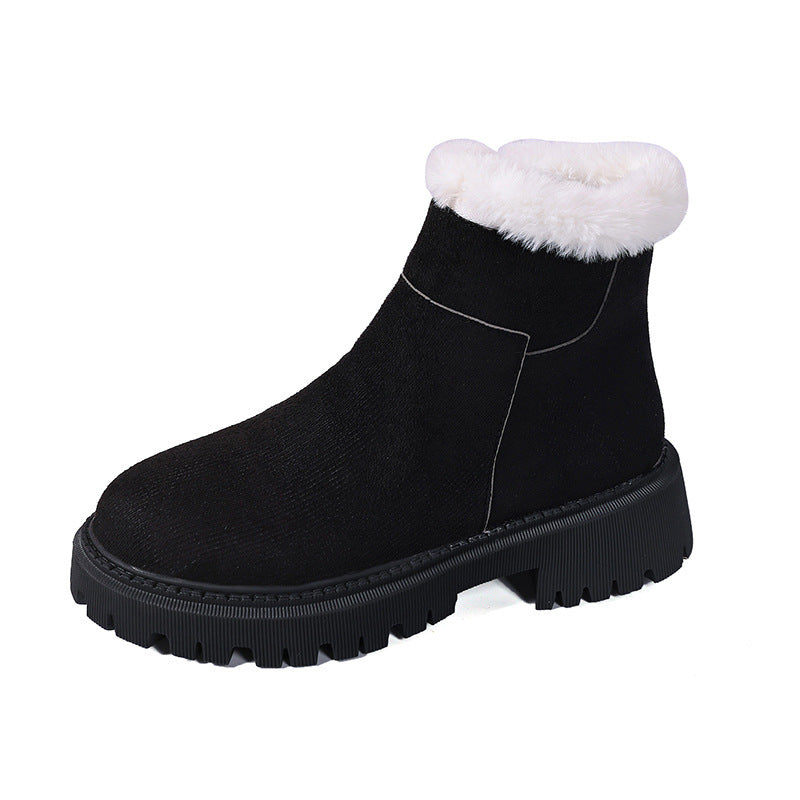 Black suede ankle boot with white faux-fur cuff and chunky lug sole
