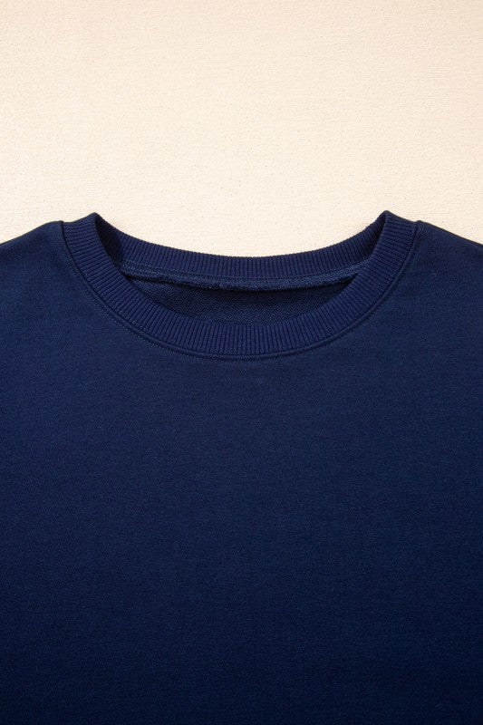 Navy crewneck pullover with ribbed neckline