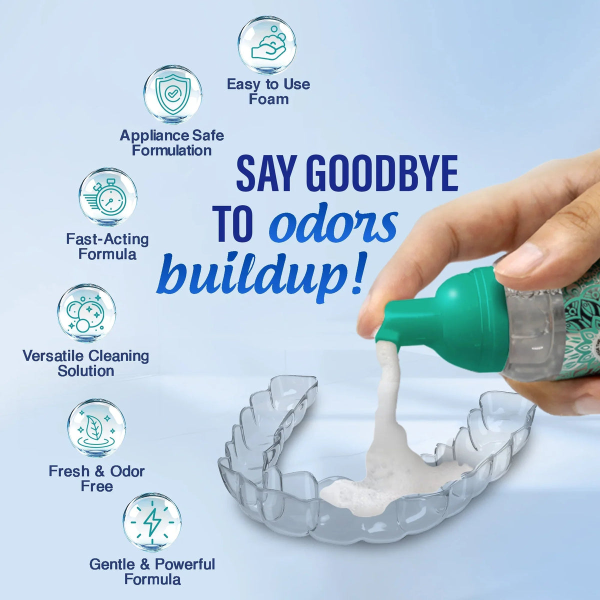 Hand squeezing teal foam onto clear aligner retainer tray in cleaning device