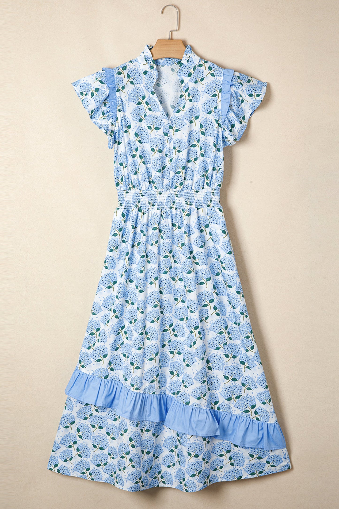 Sky blue long dress on hanger with flutter sleeves, V-neck, tiered ruffle hem, floral print