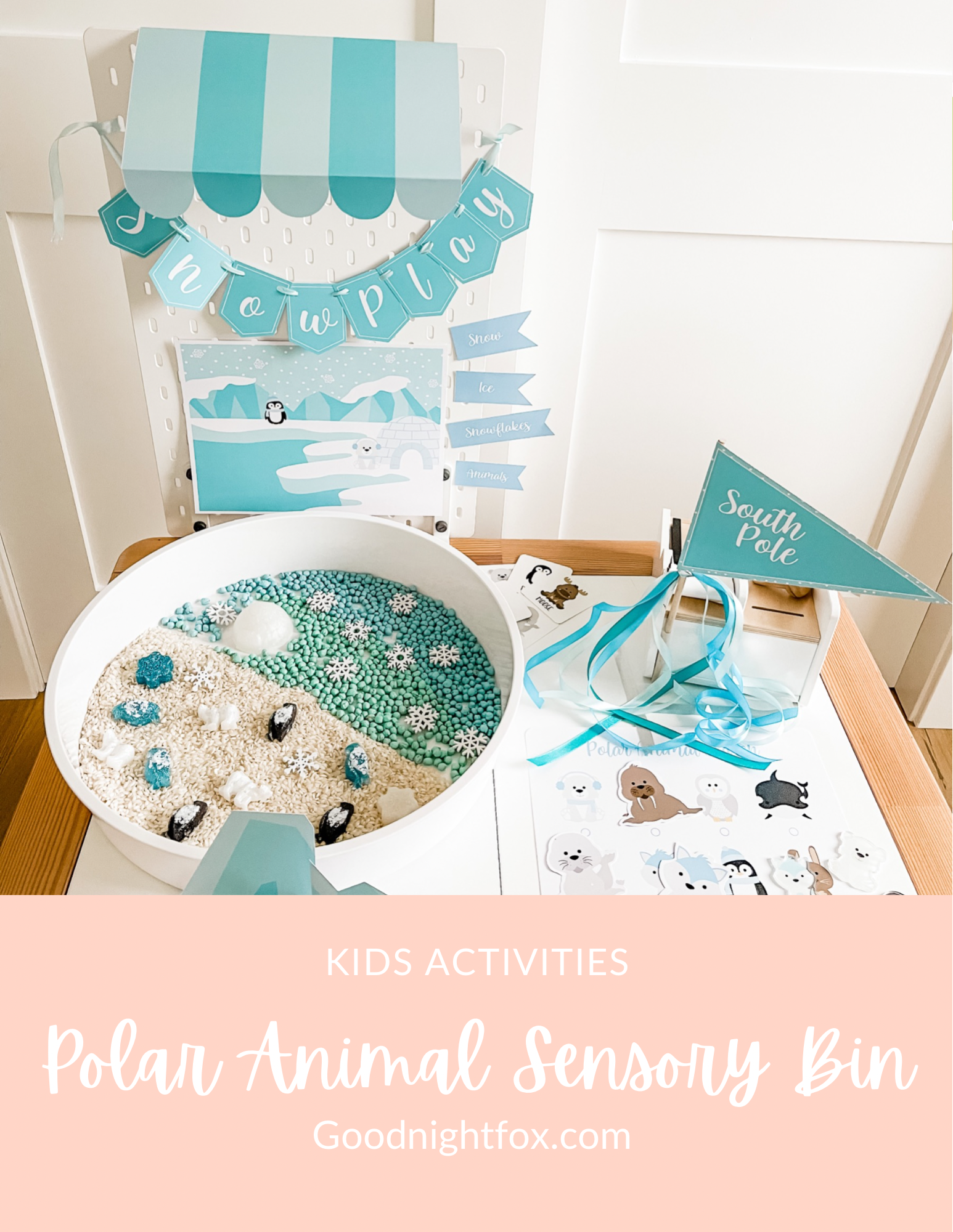 Polar animal sensory bin kit with circular tray, blue sign, and ribbon streamers