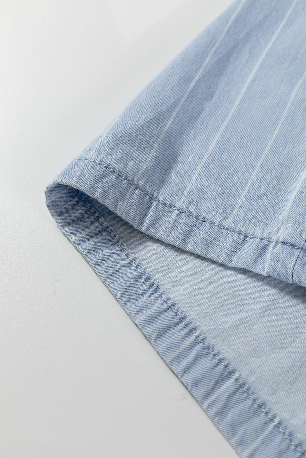 Sky blue stripe trouser hem with double-stitched edge