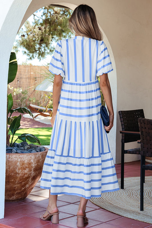 Sky blue stripe half-sleeve vacation dress, back view with tiered ruffle hem