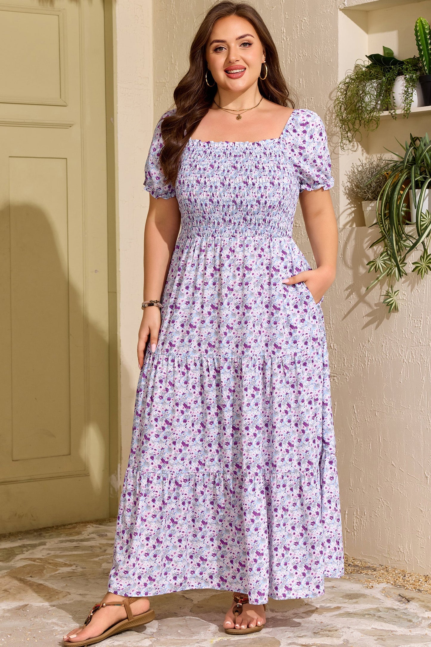 Purple floral maxi dress with smocked square neckline and puff sleeves, pleated tiered skirt